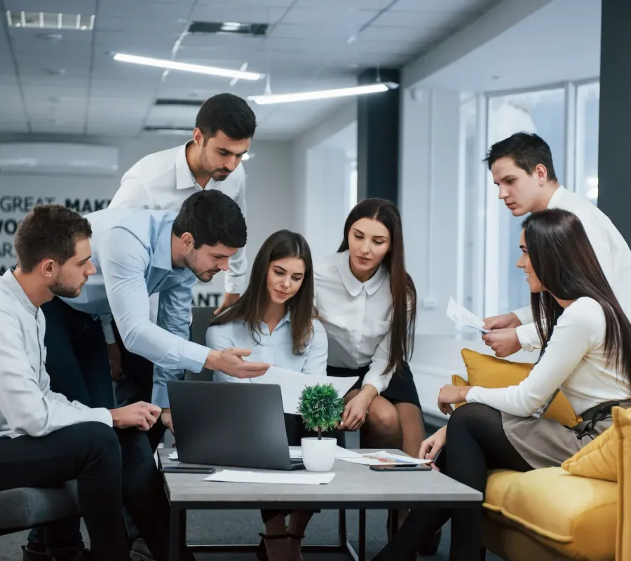 guy-shows-document-girl-group-young-freelancers-office-have-conversation-working.webp guy-shows-document-girl-group-young-freelancers-office-have-conversation-working.webp